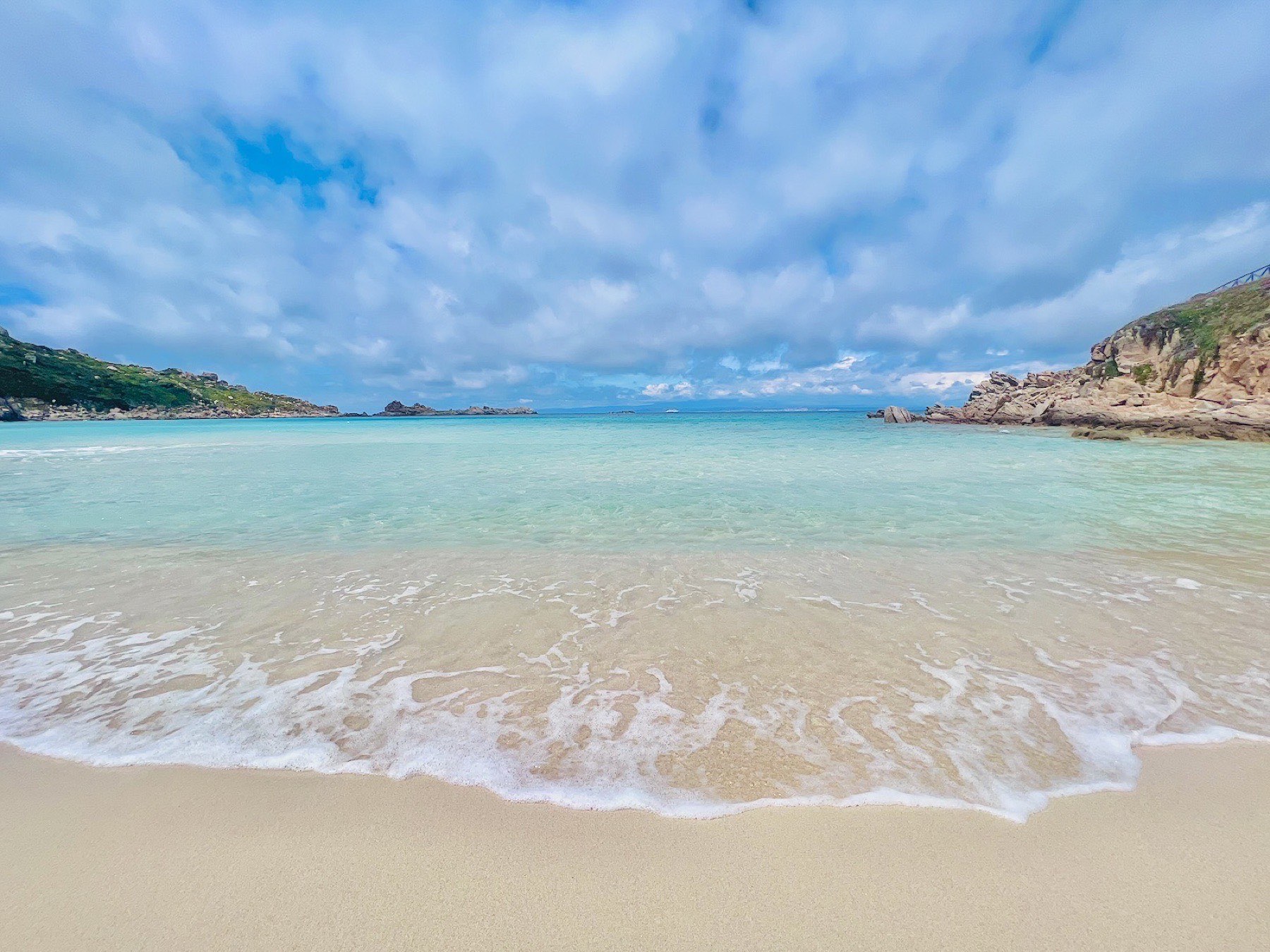 Shallow turquoise water at Rena Bianca, Santa Teresa di Gallura